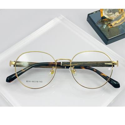 China Hot sale classic wild round optical frame metal men and women ROUND shape glass frame and wooden glass eyewear for sale