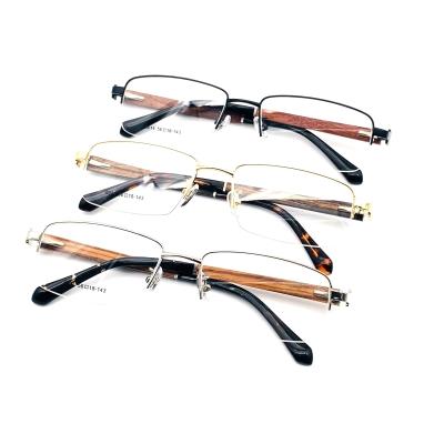 China 2021 Classic New Team Wooden Leg Design Retro Metal Frame Grain Glass Frame Eyeglasses Frames for sale