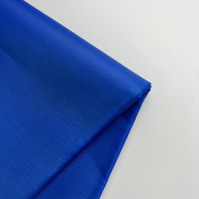 China Yiwu viable hot sale factory cheap price PU coated printed fabric lining 210t poly taffeta lining for sale