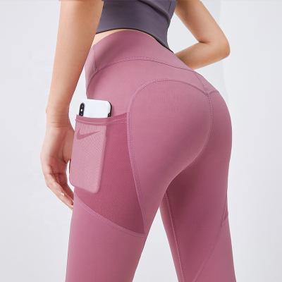 China Wholesale Custom Breathable Gym Yoga Seamless Pants With Pockets Women Fitness Tights Sportwear Workout Clothing Plus Size Sweat Gaiters for sale