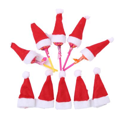 China 2021 Christamas Hot Christmas Decorations Mini Product Christmas Lollipop Hat Christmas Non-woven Fabric Hats Cheap Christmas Decorations 4*7cm for sale