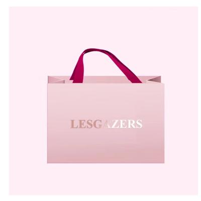 China Eco - Friendly Material Eco - Friendly Shopping Paper Bags With Logo Printing Pink Luxury Paper Bags for sale