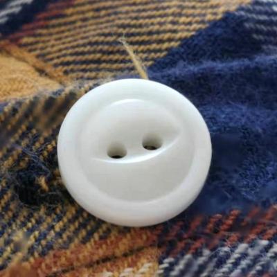 China Eco-friendly Anti-rust corozo material custom wood nut buttons ivory sustainable recycled 4-Holes button maker 20L buttons for clothes for sale