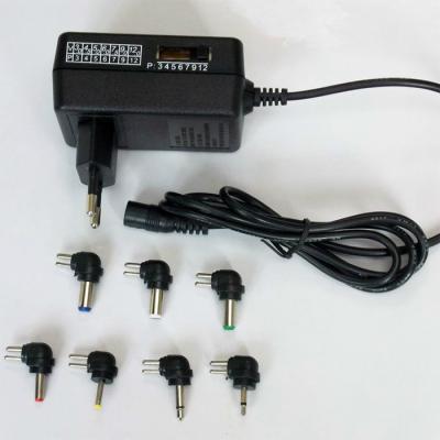 China EU plug multiple outputs 3-12v adjustable voltage adapter1a output max 12W BX-1201000 for sale