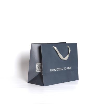 China Modern And Stylish Recyclable In Fashion Promotional Blue Jewelry Packaging Paper Gift Bag for sale