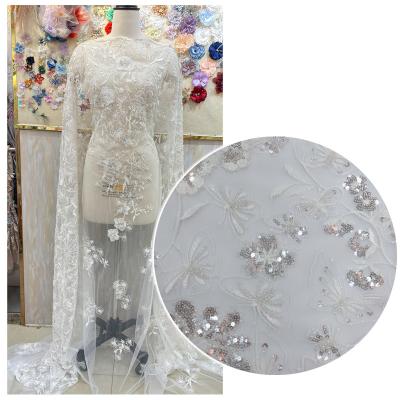 China Viable Exquisite Poly Rope Lace With Sequins Embroidery Fabric Light Blue Dress Hot Sale Sample Available for sale