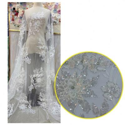 China Champagne Handmade Luxury Mesh Embroidered Tulle For Lace Up Printed Sequin Embroidery Dress Fabric for sale