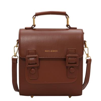 China 2022 New Vintage Postman Backpack Stylish British School Chic Designer Letter Pu Letter PU Leather Handbag Waterproof Ladies Backpack for sale