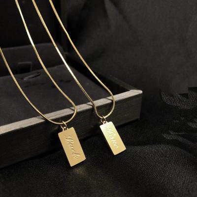 China Trendy Square Small Dog Tag Necklace Personalized 18k Gold Stainless Steel Pendant With Snake Chain For Women for sale