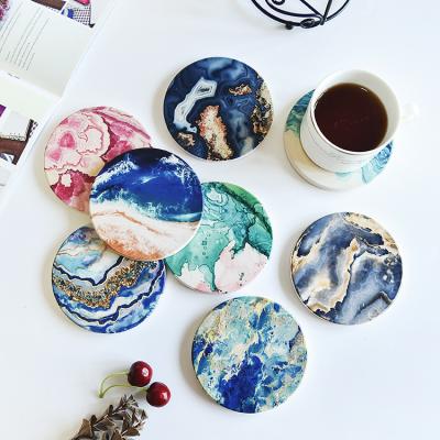 China Viable Wholesale Sublimation Round Blank Ceramic Coaster For Heat Transfer Printing Mug Coaster for sale