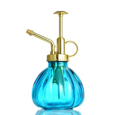 China Luxury Garden Hand Press Flower Antique Glass Watering Pot Can Mini Watering Can Glass Bottle Colorful Luxury Style for sale