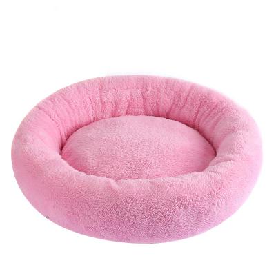 China 2021 Quality Breathable Cheap Portable Fluffy Round Donut Small Size Pet Bed For Cat Dog for sale