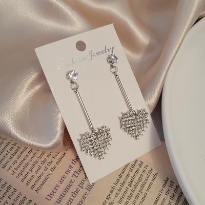 China New high-grade temperament sweet love heart full of diamonds dangle earrings women's S925 silver needle earrings for sale