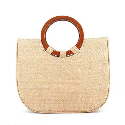 China Women's Bag Woven With Grass And Wooden Handle For Leisure Featuring Fashion Designs for sale