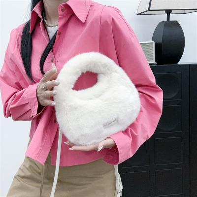 China Winter Brown Mini Fox Fur Handbags Long Chain Fluffy Fur Bags for Sophisticated Women for sale