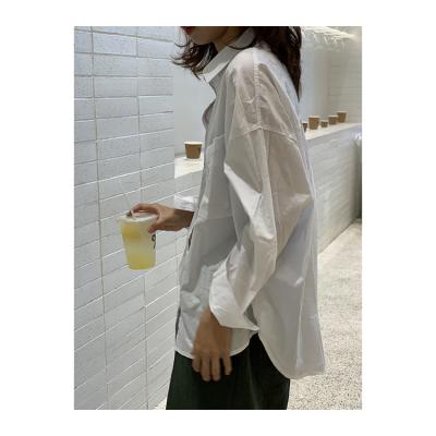 China Lady Blouses High Quality Anti-shrink Topline Irregular Pocket Tops Lengthened Women Blouse Shirt for sale