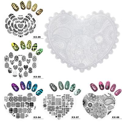 China 1Pcs Salon Heart Environmental Plastic Nail Stamping Plates Image Plates Stencil Stamp DIY Plastic Nail Art Template Manicure Nail Tools for sale