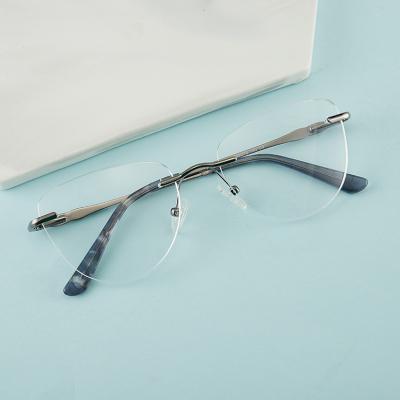 China Women's Business Glass Frame New Vintage ALLOY Round Rimless Metal Frame for sale