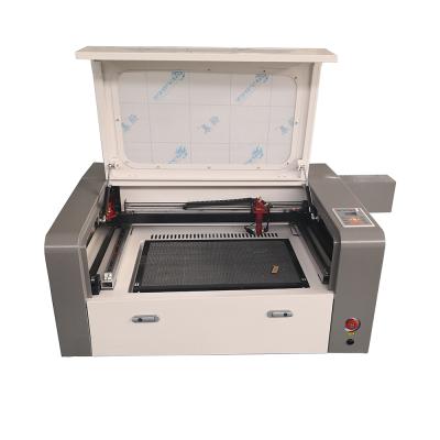 China High efficiency cnc laser cutting machine for non metal 4060 CO2 laser engraving cutting machine for sale for sale