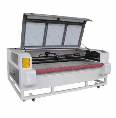 China Water Cooled Fabric Cutting Machine With CO2 Laser Engraving Cutting Machine For Nonmetal Engraving And Cutting for sale