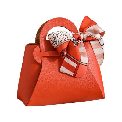 China Enchantment of Scarves Sweet Candy Knot Bow Bag Gift Color Wedding Gift Box Packaging Paper Bag for Guest Keepsake Bag for sale