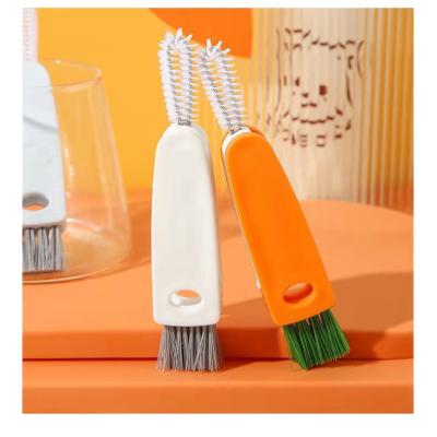 China Viable Multi-Function Rubber Ring Baby Bottle Nipple Cleaning Brush Lid Bowl Heat Storage Lid Cleaning Brush for sale