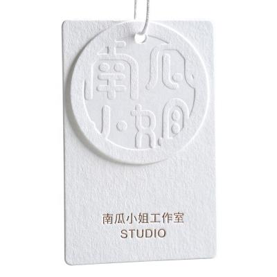 China Sustainable Custom Luxury Apparel Hanging Label Debossed Logo Swing Tags Embossed Brand Hang Tags Paper Hangtag For for sale