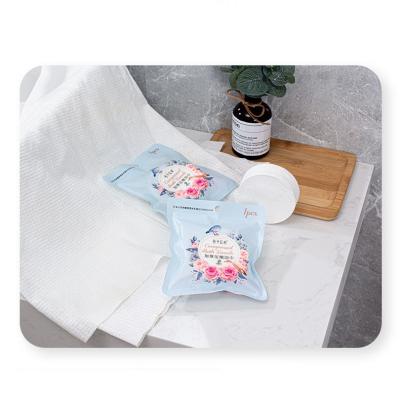 China 300 Pieces / Carton Single Pack Cotton Bath Facial Tissue Towel Easy Take Disposable Cotton Towel for sale