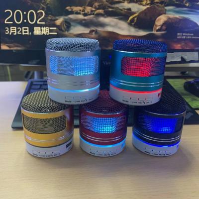 China Car BluetooSth Mini Bass Wireless Creative Frosted Luminous Speaker Small Seven-color Wireless Steel Gun Audio LED Small for sale