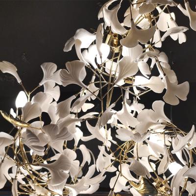 China Modern Designer Creative Petal Light Living Room Restaurant Art Lobby Sales Office Staircase Decoration Leaf Chandelier for sale