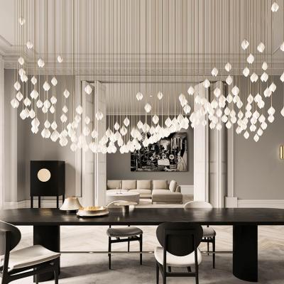 China Large Petal Leaf Hotel Villa Contemporary Modern White Ceramic Lobby Chandelier Pendant Light for sale