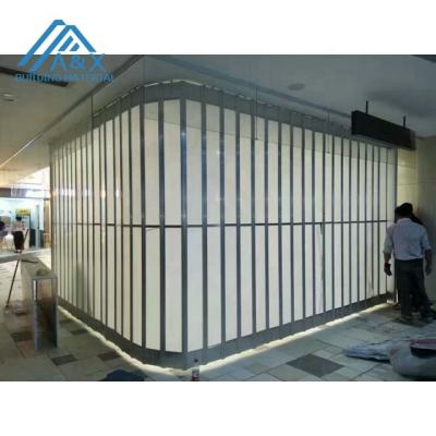 China Sliding Folding Polycarbonate Crystal Folding Door /auto shop folding shutter door/bulletproof plastic door for sale