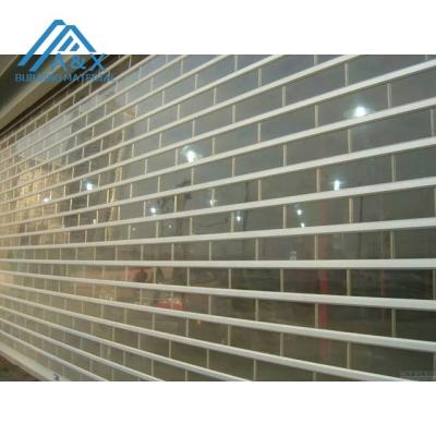 China Automatic High Reliability Automatic Clear Transparent Polycarbonate Roller Shutter For Commercial Store for sale