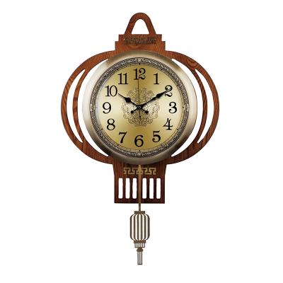 China Yiwu Huifeng style home decoration of new pendulum modern single-sided round Chinese antique clock wall clock for sale