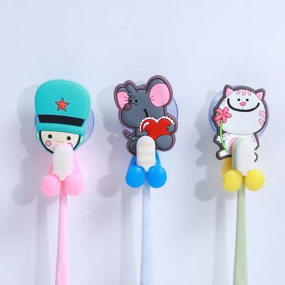 China Multifunctional Sustainable Kids Toothbrush Holders Cartoon Travel Toothbrush Holder With Suction for sale