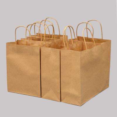 China Thick Paper Bag Recyclable Kraft Paper Packaging Bag Recyclable Custom Clothing Gift Shopping Bag for sale