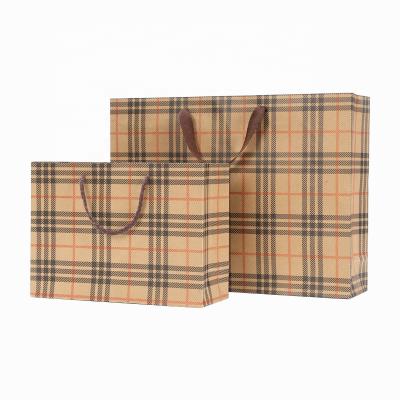 China Biodegradable Thicken Kraft Paper Bag Gift Clothing Packaging Shopping Bag Lattice Portable Paper Bag for sale