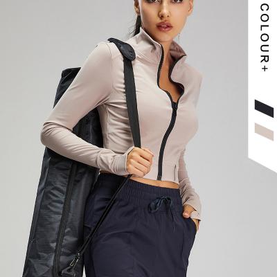 China New Fashion Sustainable Yoga Elastic Slim Wear Sheath Long Warm Top Zipper Casual Short Sports Jacket For Women for sale