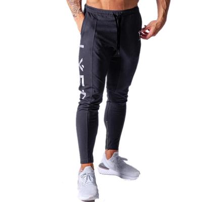 China New Jogging Anti-Wrinkle Pants Men Sport Slim Fit Pants GYM Pants Bodybuilding Pants Sweatpants Men Running Cotton Pants for sale