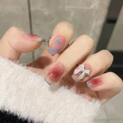 China Design 24 Pcs Wholesale Cute Design Girls Kids Wearable Fake Art Nails Press On Fingernails With Glue for sale