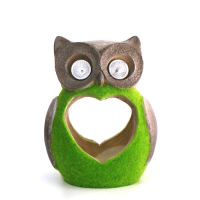 China Asian Zen Outdoor New design decor flocking resin owl statue decoration solar lamp for garden ornaments for sale