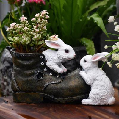 China 2021 Hot Sales Minimalist Customized Hand Craft Resin Truss Plant Pot With Plant Ornament Rabbit Garden Decor Outdoor And Indoor Pots for sale