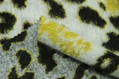 China Sexy Black And Yellow Leopard Wool Fauc Fur Fabric Fashionable Coat for sale