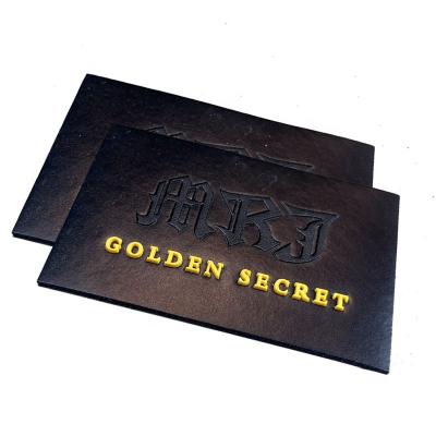 China Custom Viable Personalized Embossed Leather Logo Jeans Genuine Leather Patch Label & Tags For Garment Bags Shoes Tops OEM Customized for sale