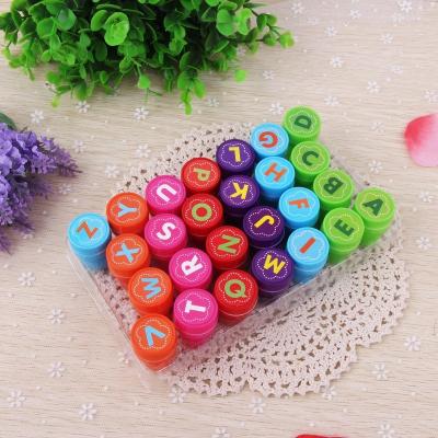 China Children's Toy 26 Alphabet Self Inking Letter Stamp Round Rubber Stamp Plastic Number Stamp Sets for kids for sale