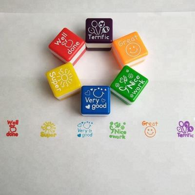 China Children's Plastic Toy Cube Stamps Kids Play Self-Inking Stamp for sale