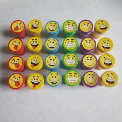 China Custom Children's Toy 24pcs Funny Stationery Toy Plastic Stamp Set Smile Face Expression Stamp Set for sale