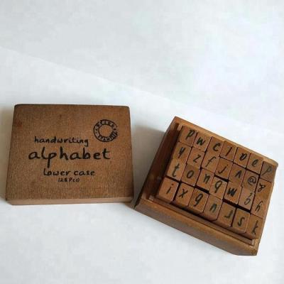 China Children's Toy 28 Pcs Rubber Wooden Stamps Alphabet Letter Number Wood Set Stamp for sale