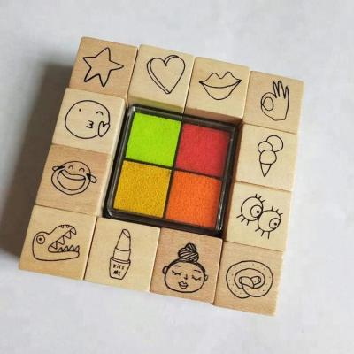 China Non-Toxic 12 Pcs Wooden Rubber Diary Stamps With Four Colors Ink Pads For Baby for sale