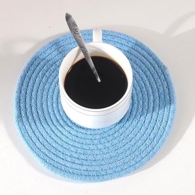 China Durable Heat Resistant Pad Braided Cotton Weave Round Wire Lug Tripods Dish Place Mat Hot Pads Table Mat For Kitchen for sale